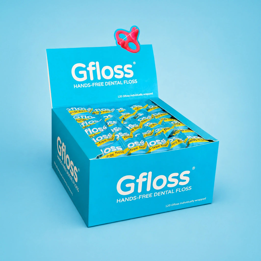 Gfloss hands-free dental floss box with 120 individually wrapped flossers for daily oral care.